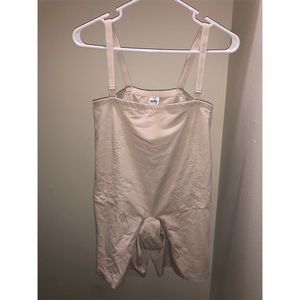 Postpartum recovery support garment